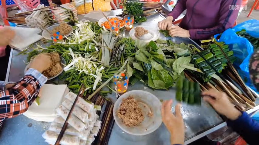 street stall of grilled pork and beef rolls in Quang Ngai