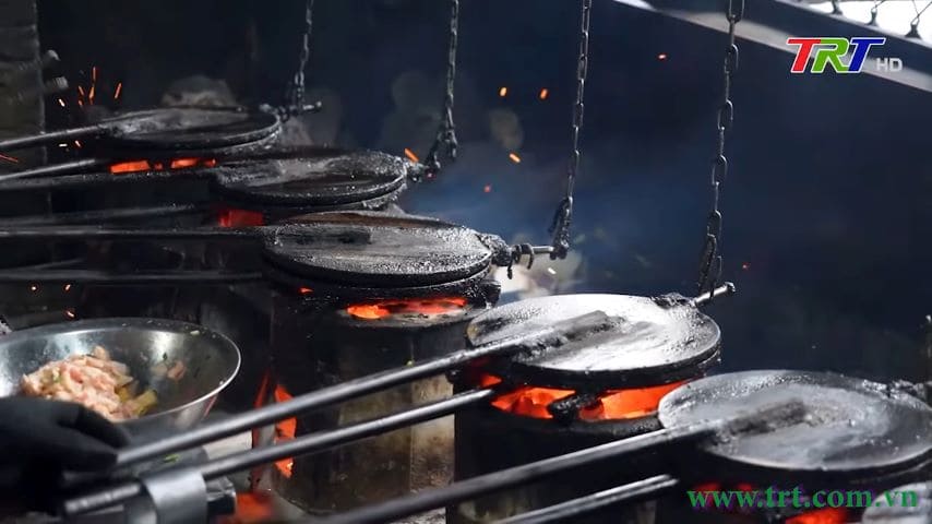 A row of cast-iron pans